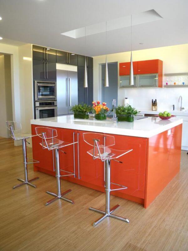 Modern Minimalist Kitchen With Coral Kitchen Island And Kitchen Cabinets Ideas Wooden Laminate Floor And Countertop Gray Shelves Bar Stool